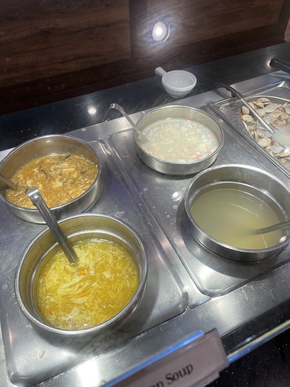 Printed menu with rice, noodles, and appetizers.
